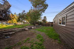 View of fenced backyard