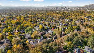 Aerial view of property's location with a mountainous background