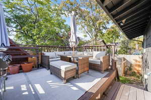 View of patio / terrace featuring a deck, grilling area, and an outdoor hangout area