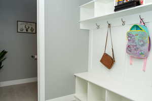Mudroom featuring baseboards