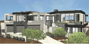 Contemporary home featuring driveway, a garage, and stucco siding