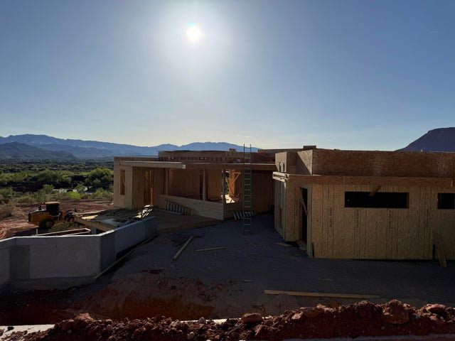 View of side of property featuring a mountain view