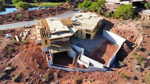View from above of property with a large body of water