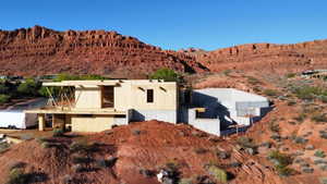 View of mountain backdrop featuring a desert landscape
