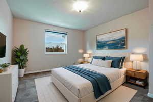Bedroom with carpet and baseboards