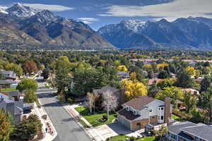 Aerial view of residential area with a mountainous background
