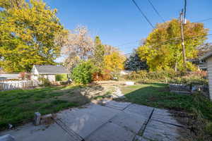 View of yard with a patio