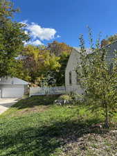 View of yard featuring view of wooded area