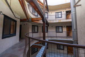 Center of building has open air atrium to bring in natural light