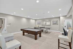 Playroom with light colored carpet, recessed lighting, and pool table