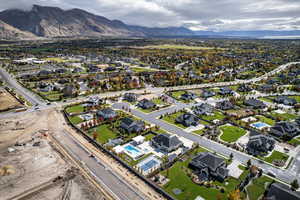 View of property location featuring a mountain backdrop and nearby suburban area