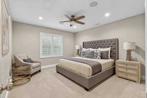 Bedroom featuring ceiling fan, recessed lighting, and carpet flooring