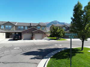 View of Townhouse with flag in front