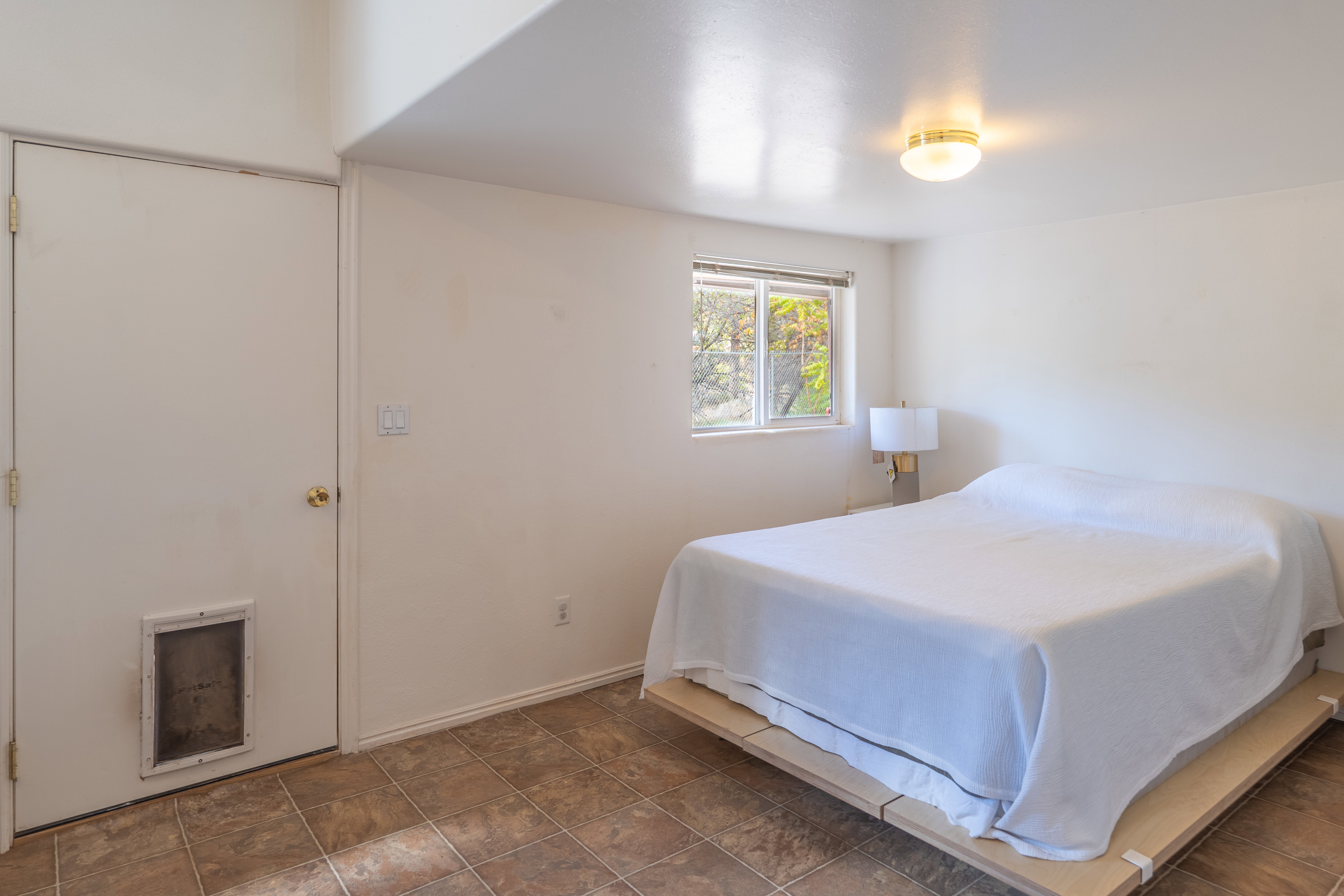 Bedroom featuring baseboards