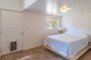 Bedroom featuring baseboards