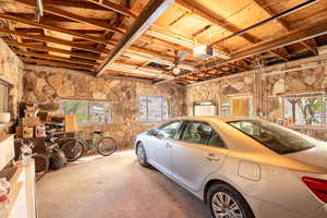 Garage featuring a garage door opener