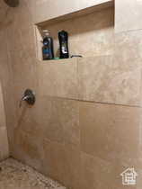 Bathroom with tiled shower
