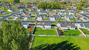 View of property location with nearby suburban area