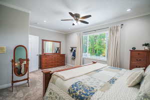 Bedroom featuring ornamental molding, ceiling fan, a textured ceiling, carpet floors, and recessed lighting