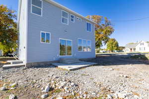 Back of property featuring a patio area