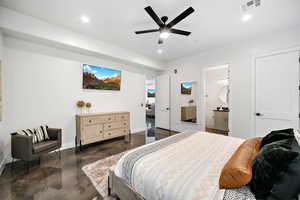 Bedroom featuring finished concrete floors, recessed lighting, a ceiling fan, and connected bathroom