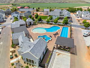 View of pool featuring a patio area and a residential view