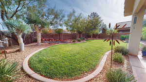 View of fenced backyard