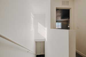 Stairway with healthy amount of natural light