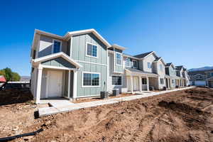 View of front of property with board and batten siding