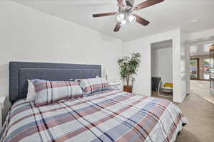 Bedroom featuring carpet and ceiling fan