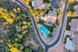 Aerial overview of property's location featuring a pool area