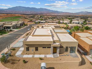 Aerial perspective of suburban area featuring mountains