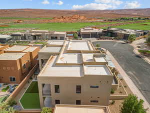 Aerial view of a local golf course and mountains