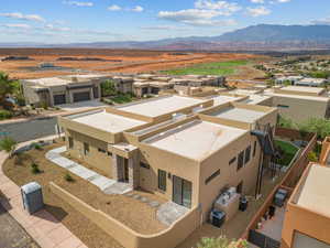 Aerial perspective of suburban area with mountains