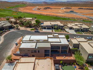Aerial view featuring a mountain view and view of golf course
