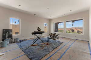 Interior space with visible vents and baseboards