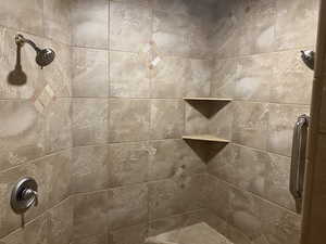 Casita Full bathroom featuring a walk-in shower with tile