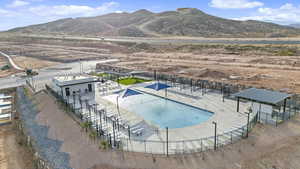 Community pool featuring a patio area and a mountain view