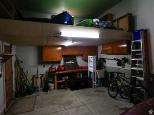 Garage featuring a workshop area