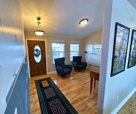 Foyer featuring light wood-type flooring