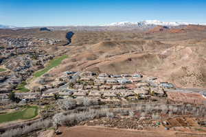 View of property location featuring nearby suburban area and a mountainous background