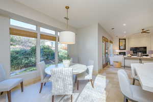 Dining room featuring recessed lighting and a ceiling fan
