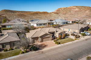 Aerial view of residential area featuring mountains