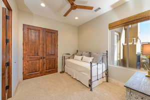 Bedroom featuring carpet flooring, ceiling fan, and recessed lighting