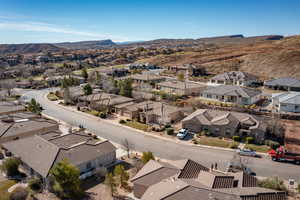Aerial view of residential area with a mountain backdrop