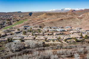 View of mountain background featuring nearby suburban area