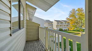 Balcony with neighborhood/park view