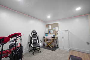 Office space featuring baseboards and recessed lighting