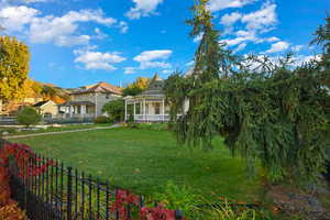 View of yard with a porch