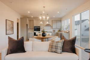 Living room featuring a chandelier